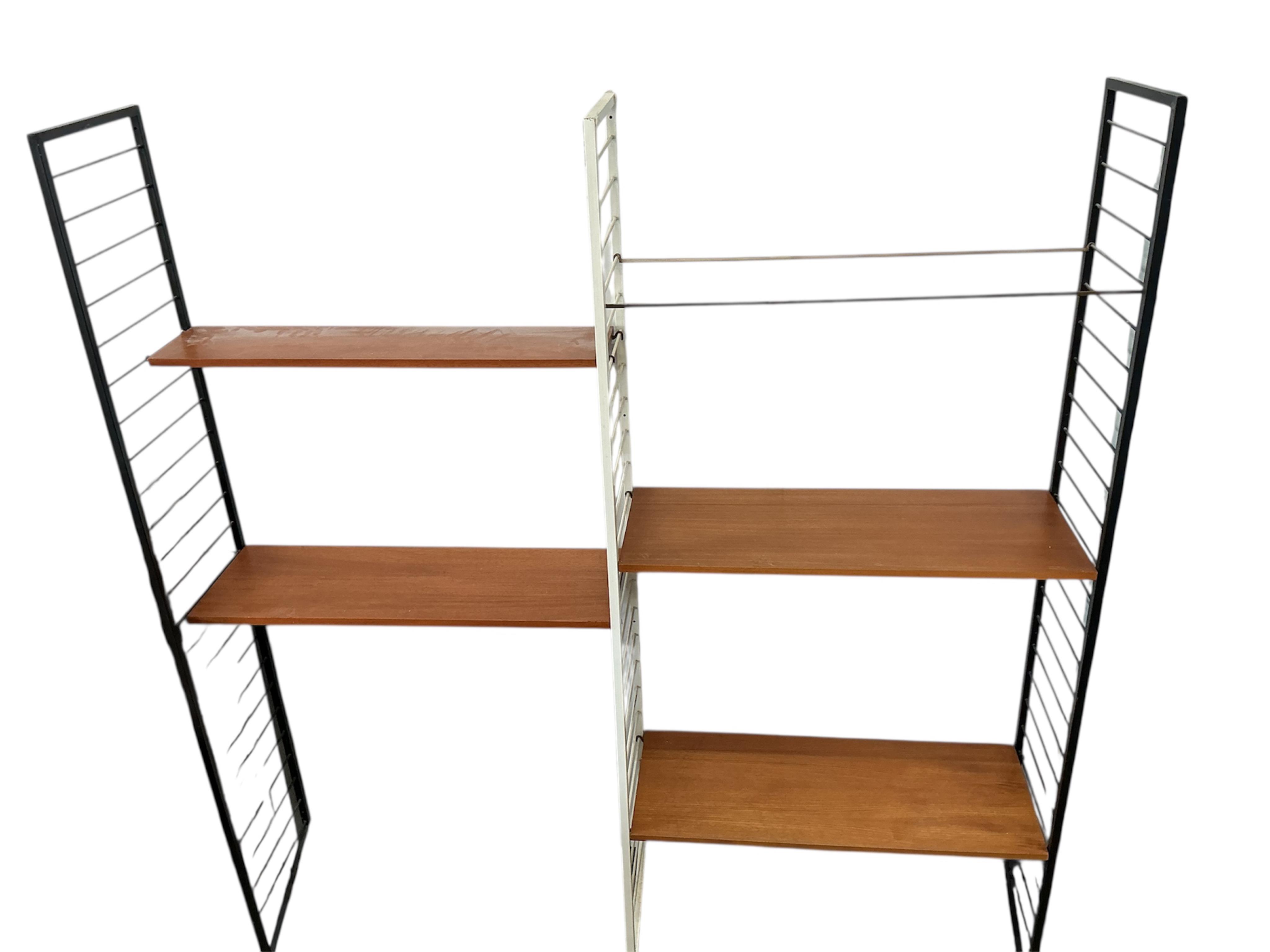 A mid century teak Ladderax type shelving unit, width 185cm, depth 36cm, height 200cm